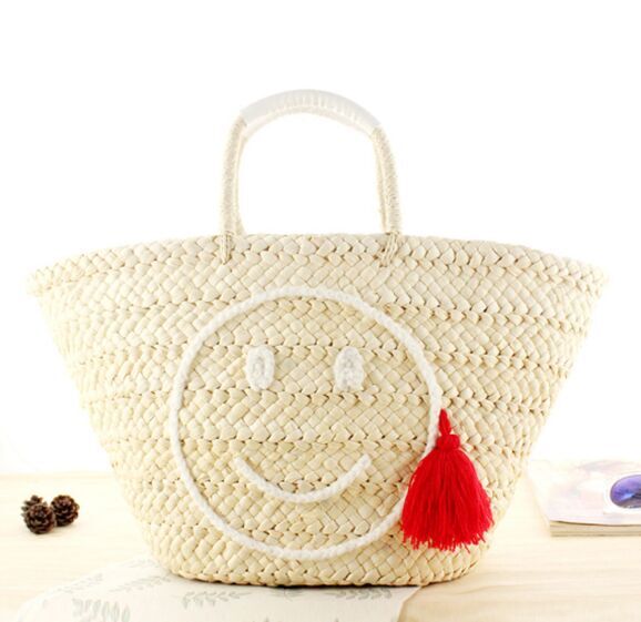 2018 Fashion Straw handbags Smile embroidery with Tassel bulk natual color