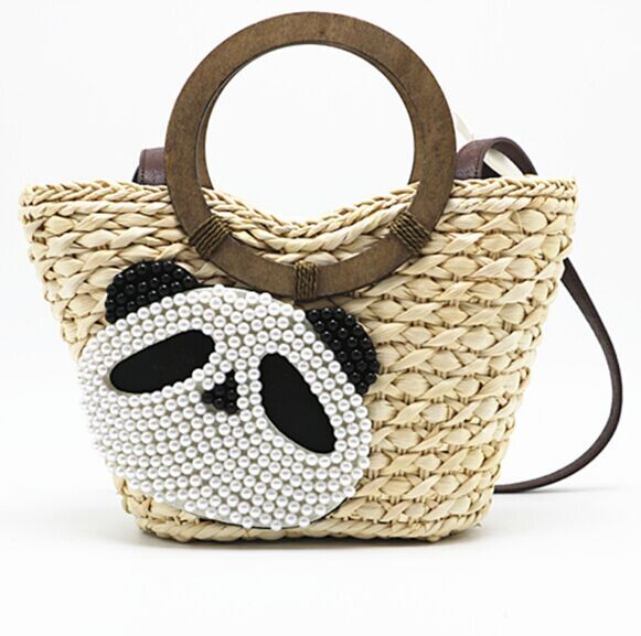 New Design Straw handbags with circle handle pom poms  crossbody bags manufacturer
